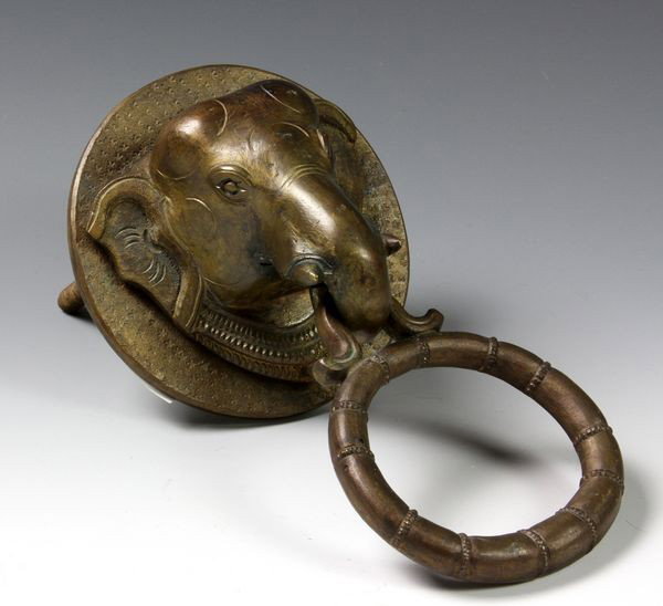 Indian 19th C. Brass Door Knocker: Brass Door Knocker, Indian, 19th century, in the form of an elephant's head, 7" high x 4" wide.