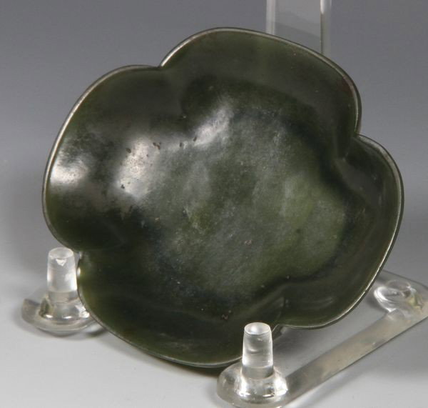 Chinese 19th C. Dark Jade Dish: Dark Jade Dish, China, 19th century, the quatrefoil form with a small foot, 2 1/2" x 3 1/4". From the collection of Henry Francis Thompson. Henry Thompson, an importer of Asian art and antiques and co