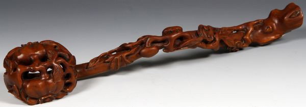 Chinese 19th C. Wood Ruyi Scepter: Ruyi Scepter, China, 19th century, wood, carved with foliate designs, 12" long.