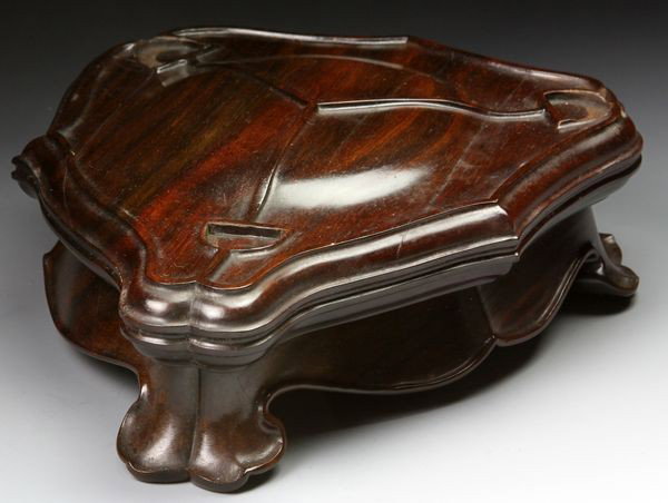Chinese Wood Stand: Wood Stand, China, Republic Period (1912 - 1949), on tripod legs, 2" high x 7" wide x 6" deep. Originally acquired by C.T. Loo & Co. of New York, NY and Paris, France. This collection was passed to th