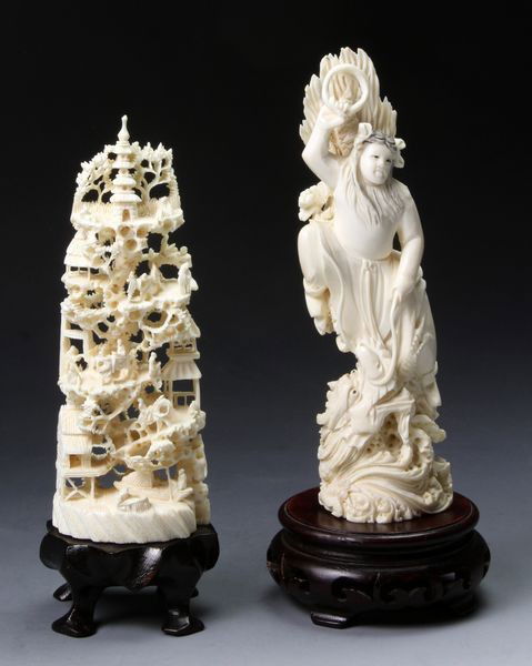 Two Chinese 20th C. Ivory Items: Two Ivory Items, China, 20th century, one of a dragon, marked on base, and one of a figures in a landscape, both on wood bases, largest is 5 3/4" high.