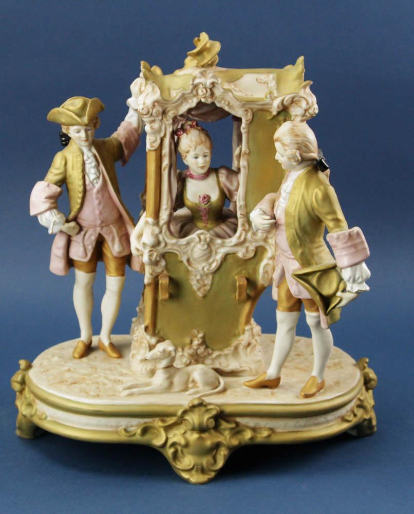 Hand-Painted Royal Dux Bisque Woman in Carriage: Hand-painted Royal Dux Bohemia bisque woman in carriage, 15" H.