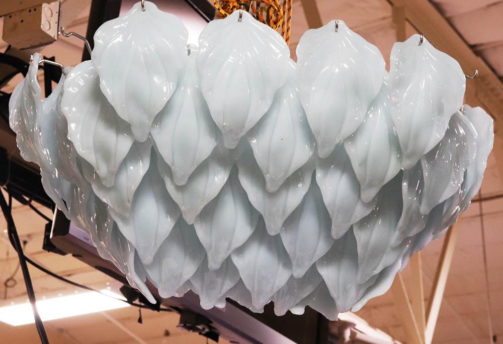 Venetian Glass Chandelier: Venetian glass chandelier, approximately 38" H x 17 1/2" W. A few missing "leaves".