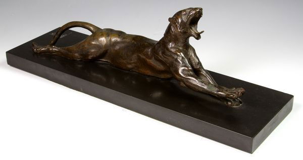 Hyatt, Bronze Lion: Anna Vaughn Hyatt Huntington (American, 1876 - 1973), bronze reclining lion, 13"l x 4 1/4"h (sculpture), 15 1/2"l x 4 1/2"w (black marble base). Good condition.