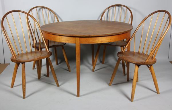 Thomas Moser Table and Chairs: Thomas Moser cherry table and four (4) chairs, table measures 30"h x 40"dia, chairs are signed and measure 39"h. Minor stains to table top, otherwise good condition.