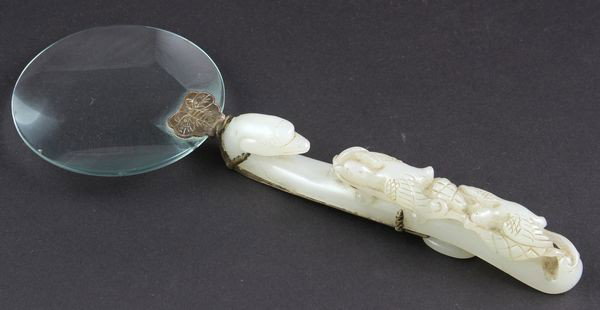 Late 19th/Early 20th C. Jade Magnifying Glass: Late 19th/Early 20th century jade-handled magnifying glass, pale green jade handle carved with flying birds, 5"l.