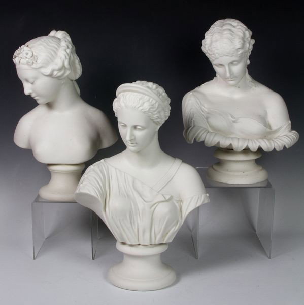 Three (3) Parian Busts: Lot of three (3) white Parian busts of women on several bases, 11"h. Good condition.