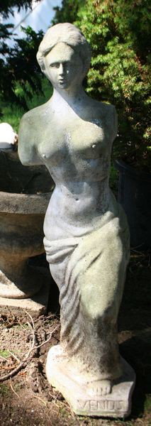 Statue Venus de Milo: Statue of Venus de Milo of concrete, 31"h x 8"w. Surface deposits, traces of white paint.