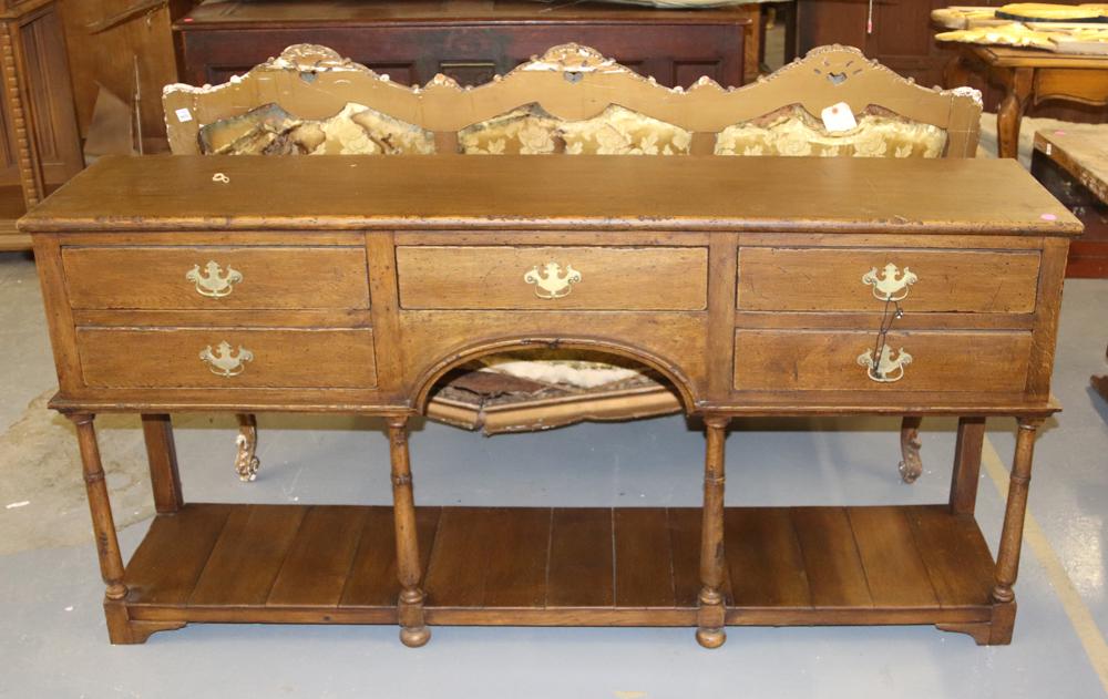 English Oak Hunt Board: English oak hunt board, antiqued, 34 3/4" H x 72" W x 16 1/4" D. Finish wear. Provenance: Anthony's Pier 4 restaurant, Boston, Massachusetts.