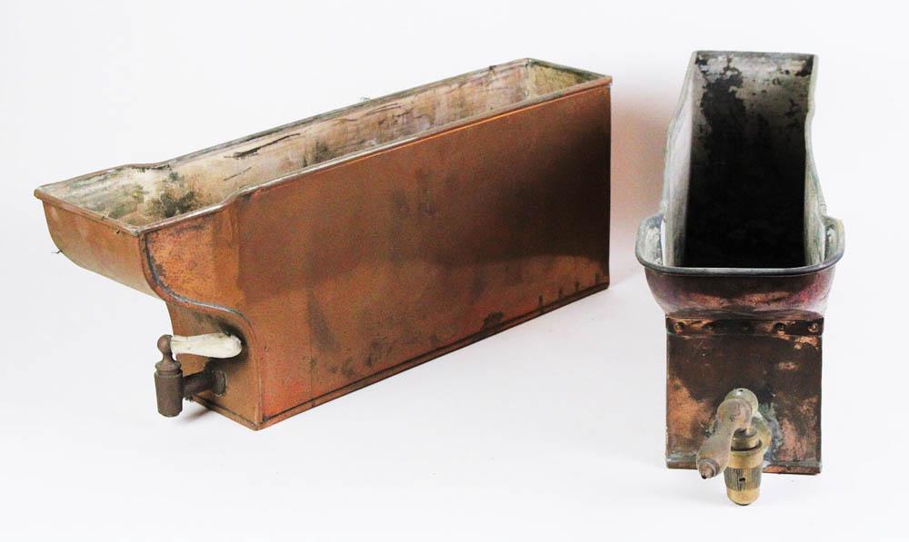 Pair of Copper Pieces with Brass Spigots, Planters: Pair of copper pieces with brass spigots to be used as planters, 9" H x 23" W x 6" D. Provenance: Athanas, The General Glover House, Swampscott, Massachusetts.