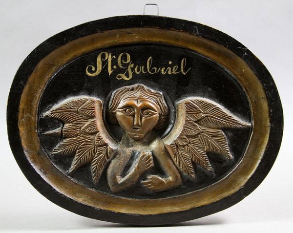 Wood Plaque of St. Gabriel: M. Wiedeman 1915 wood plaque of St. Gabriel, signed verso, 7 1/2"h x 10"w. From the Calkins' Estate.