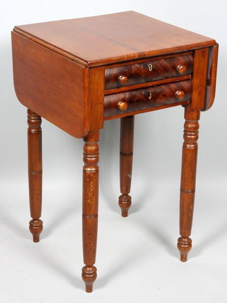 19th C. Sheraton Table: 19th century country Sheraton mahogany 2-drawer drop-leaf table. From the Calkins' Estate.