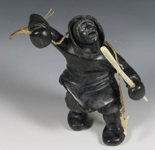 Inuit Whale Bone Hunter: Peter Atatsiak, hunter, whale bone, signed, 4" x 8". Good condition. Purchased in Nova Scotia.