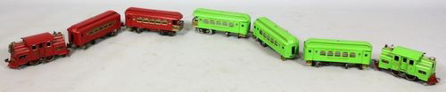 2 Toy Train Sets: Two sets Lionel New York Central Lines trains, green locomotive with three (3) cars, red locomotive with two cars. Some paint loss.