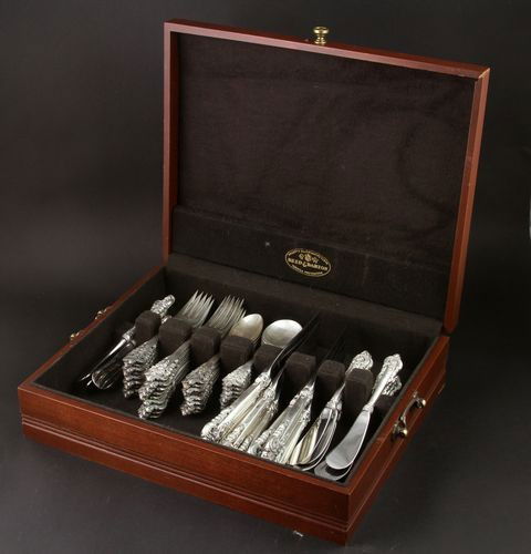 Wallace Silver Flatware Set: Wallace 'Grand Baroque' silver flatware set to include nine (9) forks 7 1/2", nine (9) forks 6 1/2", nine (9) spoons 6 1/8", nine (9) bouillon spoons 6 1/8", nine (9) dinner knives 9", and nine (9) bu