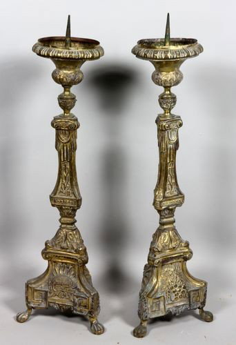 18th C. Repousse Candlesticks: 18th century Repousse altar candlesticks, brass, tripod bases, 38"h, 11" base.