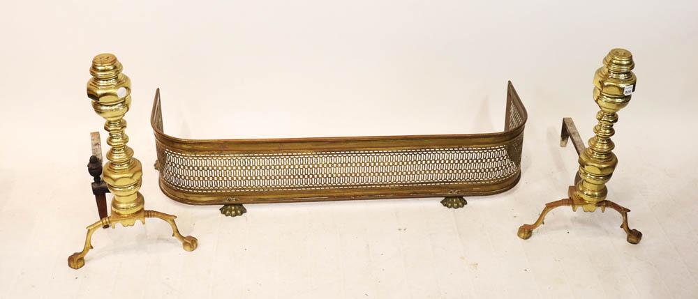 Set of Early 20thC Brass Andirons and Fender: Set of early 20th century brass andirons (2), and fender, fender 9 1/4" H x 42 1/2" W x 13" D. Provenance: Ipswich, Massachusetts collection.