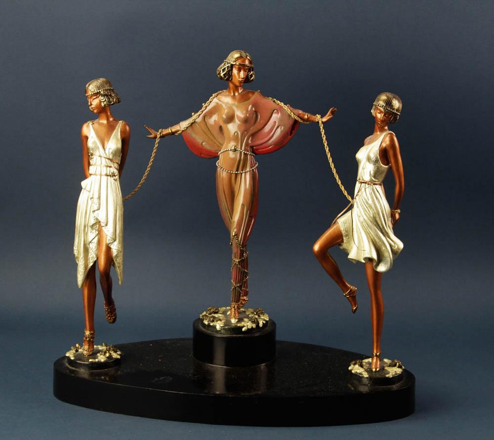 Erte, Three Bronze Ladies on Black Marble Plinth: Erte, three bronze ladies on a black marble plinth, 16 1/2" H x 17 1/2" W x 9" D; plinth 1 1/2" H. Provenance: Middleton, Massachusetts collection.