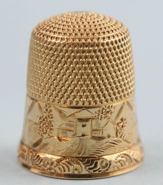 14K Yellow Gold Thimble: 14K yellow gold thimble, 0.1 oz/2 dwt total weight.