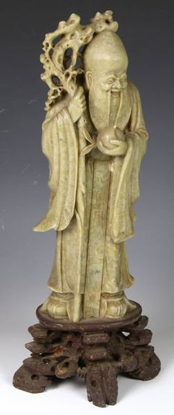 Chinese Carved God of Longevity: Figure of god of longevity, China, 19th century, carved soapstone, 14" x 5 1/2".