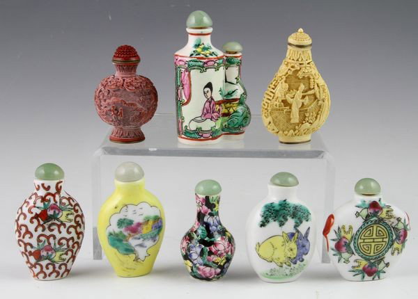 Chinese Eight (8) 20th C. Snuff Bottles: Eight (8) snuff bottles, China, 20th century, including six (6) with famille rose decorations, one (1) of carved cinnabar, and one (1) of carved bone, various designs, all with mark on base, largest 3