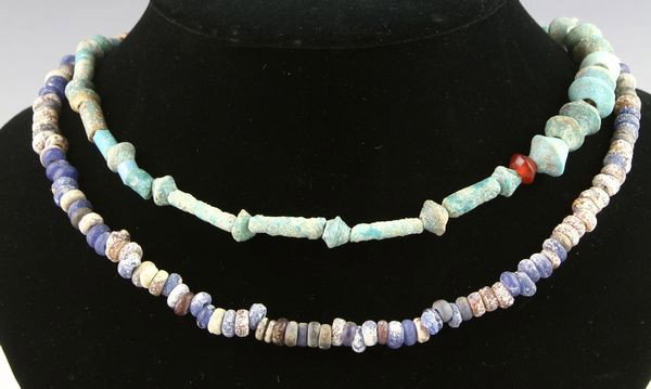 Two (2) Chinese Han Dynasty Necklaces: Two (2) glass beads necklaces, China, Han Dynasty (206 BC - 220 AD), longest 28"l. Private collection, San Francisco, California.