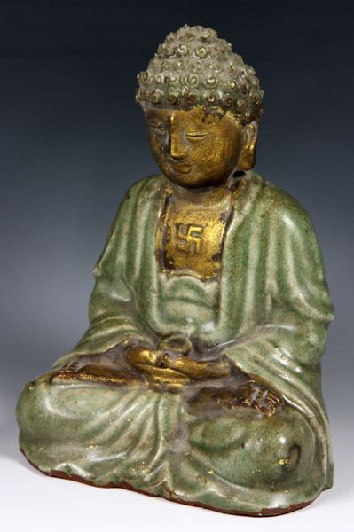 Chinese 16th C. Pottery Buddha: Seated pottery Buddha, China, 16th century, shown in meditative pose with a wan symbol on chest, with partial gilding, 8"h.