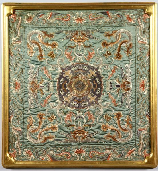 Chinese 19th C. Silk Cushion Covers: Cushion cover, China, 19th century, of green silk finely embroidered with dragons, phoenixes, and bats with a central lotus medallion, in gilt frame, 28 1/2"hx 46 1/2"w.