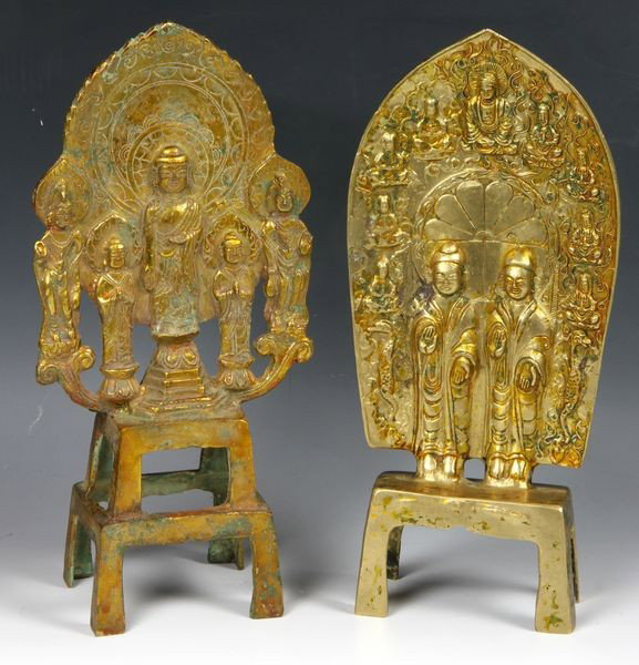 Two (2) Gilt Bronze Buddhist Stands: Two (2) Buddhist stands, each cast in relief with central figures on a petal-form mandorla, gilt bronze 9"h.
