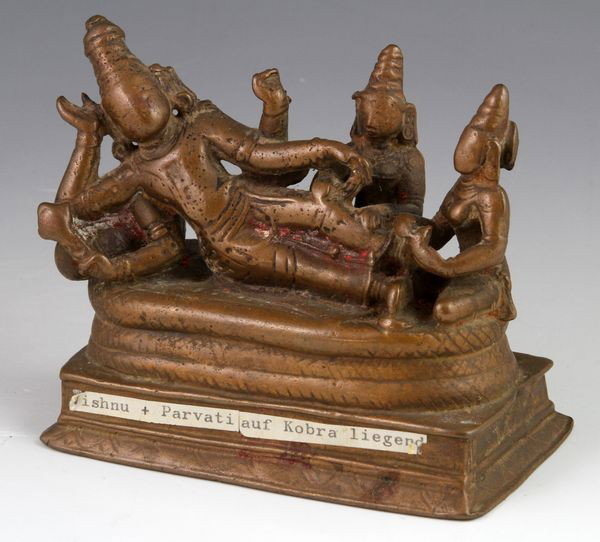 Bronze Asian Devotional Figure: Bronze devotional figure, Southeast Asia, of a seated multi-armed deity, with two attendants, 4"h.