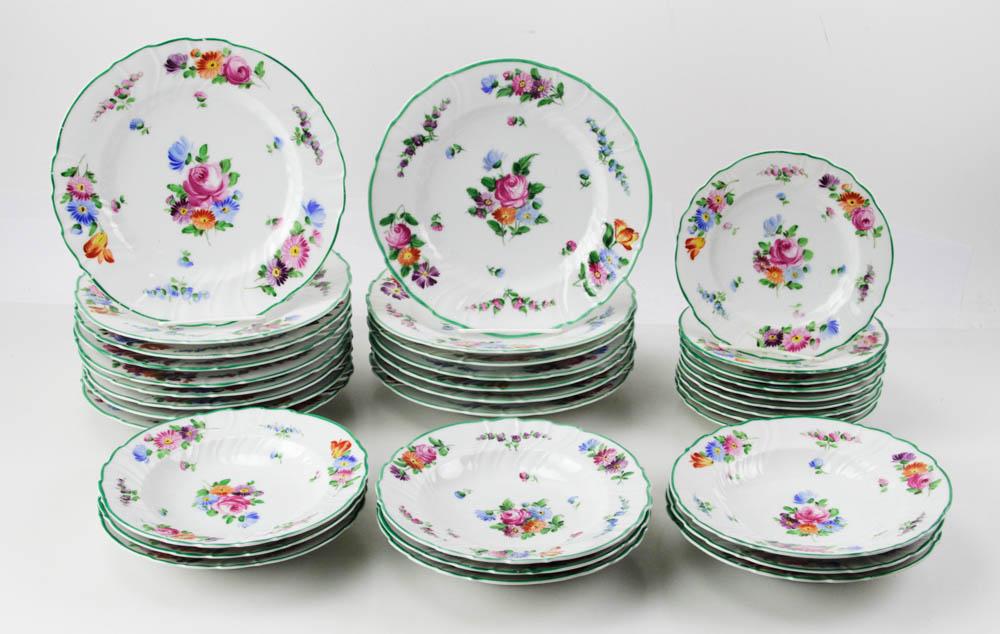 Porcelain Dinnerware, German Floral Plates: Porcelain items, to include (8) bowls, (16) luncheon plates, together with (7) German porcelain dinner plates, floral design, 7", 9 3/4". Small chip on one German plates. Provenance: Palm Beach, Flori