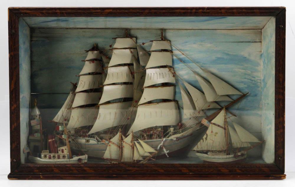 Diorama of NY Harbor with 3-Masted Ship: Diorama of New York Harbor with three-masted sailboat and three small ships including tugboat, plus a lighthouse, 13 1/2" H x 21 1/4" W x 5" D. Provenance: South Hamilton, Massachusetts collection.