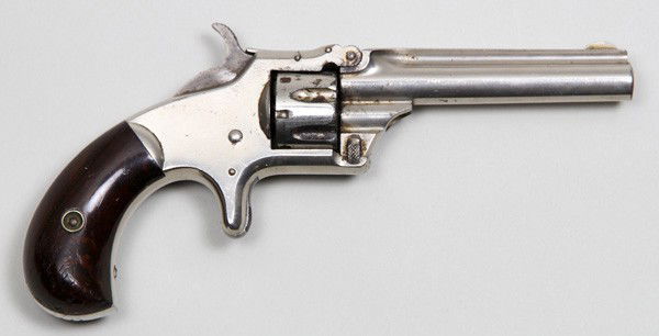 Smith & Wesson Model No. 1 .22: Smith and Wesson model no. 1 third issue 22 caliber, rosewood grips, serial #75,290, in the white, rod missing, 131,000 produced. Flay: 5G-010.