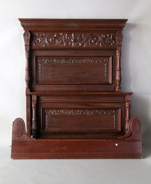 19th C. Carved Bed: 19th century bed, heavily carved, 80"h x 85"l x 66"w. Some surface scuffs and wear.