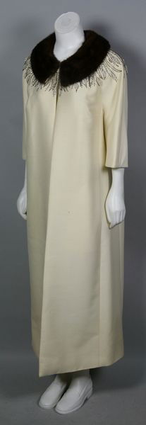 Opera Coat: Opera coat in silk faille with mink collar and beading around collar, approximate size 10/12. Some staining.