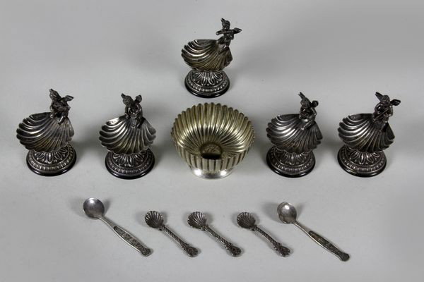 Sterling Silver Salt Dishes: Sterling silver salt dishes having cupids on shell motif, lot of five with five spoons and one odd sterling bowl, 2"h, approx 5.4 tr. oz.