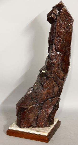 Laine, Winged Figure, Bronze: Bruce Laine (Arizona, 20th century), tall cliff with winged Icarus-like figure in flight, cast bronze having brown polished patina and turquoise accents with wood and marble base, 37 1/2" x 11" x 9".