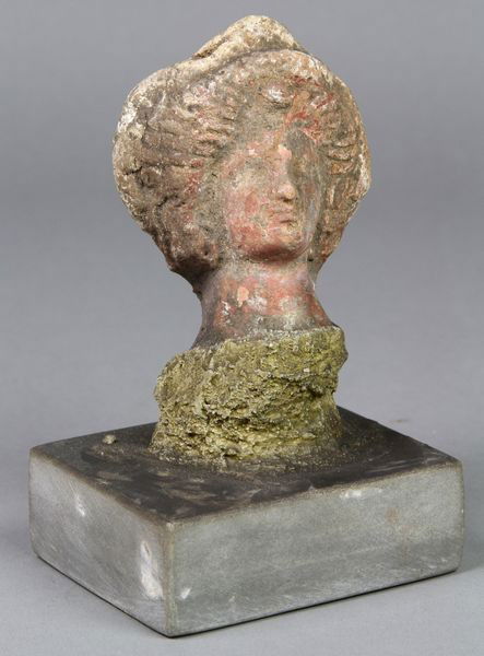 Greek Head of Tiangra: Ancient Greek pottery head of Tiangra, goddess of ideal beauty, 3 1/2" x 2 1/4".