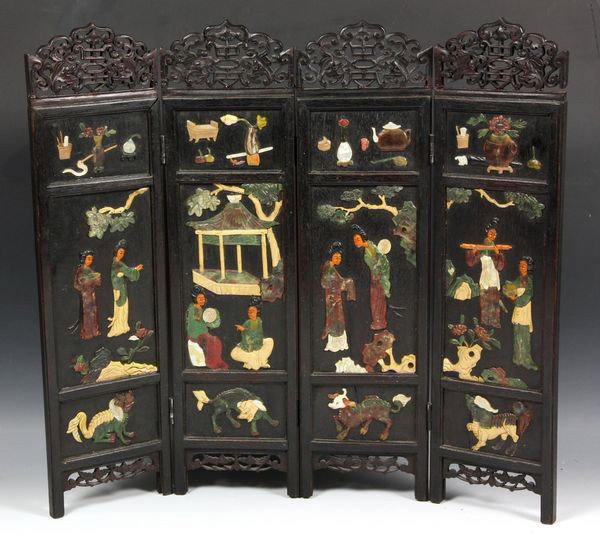 19th C. Chinese Table Screen: Four (4) panel folding table screen, China, 19th century, inlaid with jade, agate, ivory, and mother of pearls, depicting figures at leisure in courtyard scenes, with mythical beasts at the bottom pan