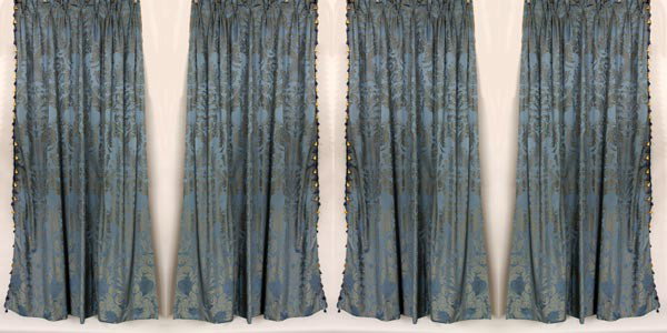 2 Pairs of Blue Damask Fortuny Style Drapes: Two pairs of blue damask fortuny style pattern drapes, having matching cornice boards, 102"l x 77"w (drapes), 16"h x 57 1/2"w x 10"d (cornice boards).