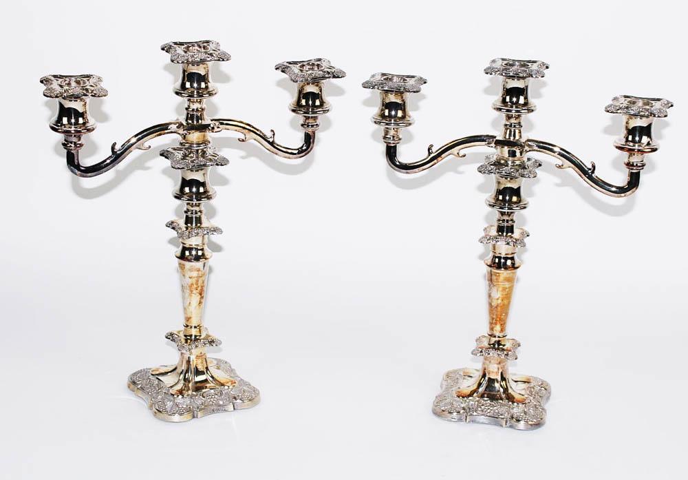 Pair of Three-Branch Silverplate Candelabra: Pair of three-branch silverplate candelabra, 13 1/2" H x 11" W. Provenance: Collection of Anthony's Cummaquid Inn, Yarmouthport, Massachusetts.
