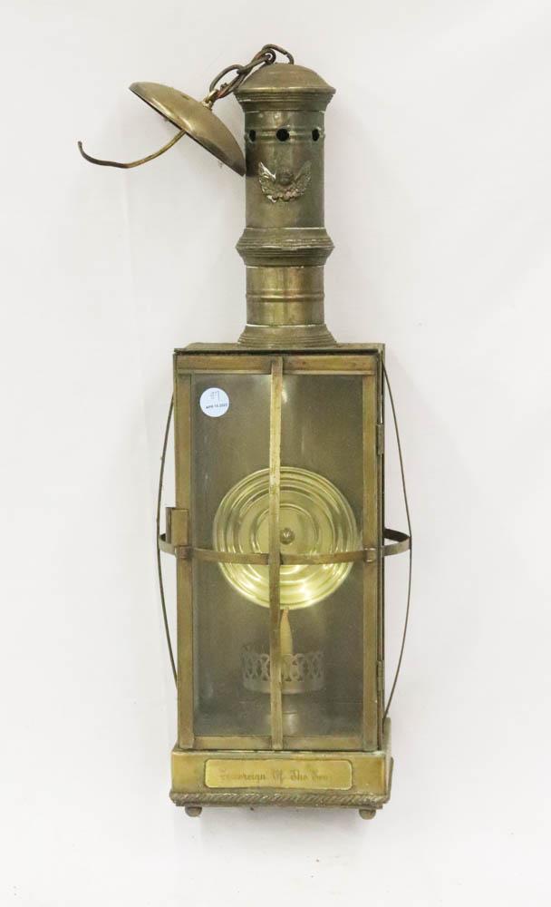 Sovereign of the Seas Brass Ship's Lantern: Brass and glass ship's lantern, marked 'Sovereign of the Seas', winged angel motif on chimney, electrified, 26" H x 7" W x 6" D. Provenance: The Anthony Athanas Collection, from one of his celebrated 
