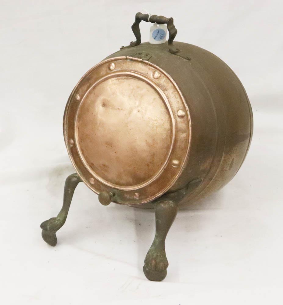 Copper Coal Scuttle With Paw Feet: Copper coal scuttle, paw-footed, approximately 16" H overall. Provenance: The Anthony Athanas Collection, from one of his celebrated restaurants.