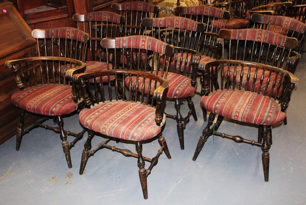 Set of Bow-Back Windsor Armchairs: Set of (8) bow-back Windsor armchairs with upholstered seats and brass tack decoration, 33 1/2" H x 24 1/2" W x 18" D. Some surface wear. Provenance: Athanas, The General Glover House, Swampscott, Mas