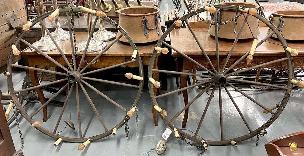 Pair of 14-Light Wagon Wheel Chandeliers: Pair of 14-light "wagon wheel" chandeliers, 45" diameter. Provenance: Athanas, The General Glover House, Swampscott, Massachusetts.