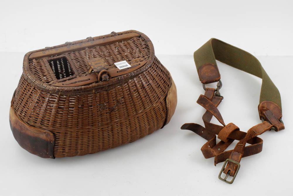 Turtle Trade Mark American Trout Basket: Early 20th century American trout basket with strap, "Turtle Trade Mark", 8" H x 14" W. Provenance: West Palm Beach, Florida estate.