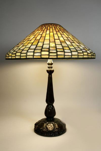 Tiffany Geometric Table Lamp: Louis Comfort Tiffany, geometric table lamp, bronze turtleback base, signed Tiffany Studios New York #1493 on shade, signed Tiffany Studios #587 on base, 25"h x 20 1/4"dia. Seven (7) quarter inch crac