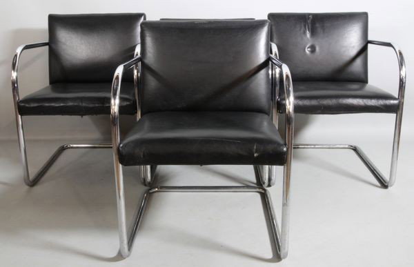 4 Thonet-style Chrome Tube Arm Chairs: Four Thonet-style, arm chairs, chrome tube with black vinyl seats, circa 1930's, 30"h, 17 1/2"h x 21 3/4"w x 24"d. Depressions to several cushions.
