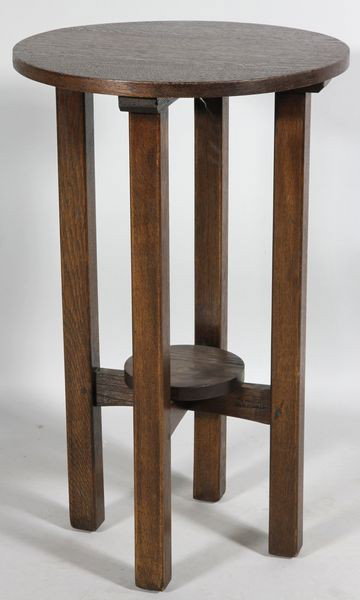 L. & J.G. Stickley 2-Tier Oak Table: L. & J.G. Stickley, two-tier round table, oak, "The Work of" brand on stretcher, joint separation on top, 29"h x 18"dia.