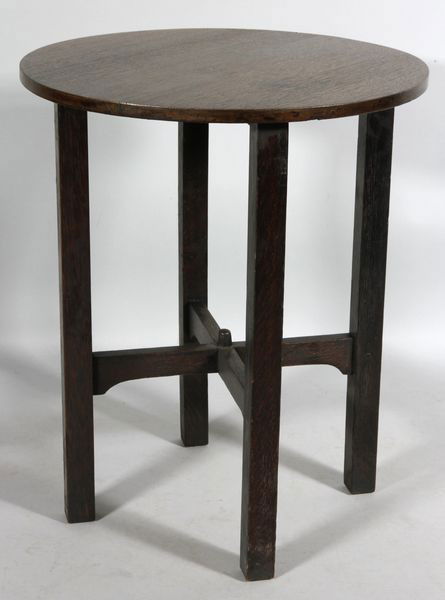 Stickley Oak Tea Table: Gustav Stickley, round tea table, oak, cross stretchers and nipple, remnant of paper label indicates circa 1905 - 1907, No. 654, 28"h x 24"dia. Top is refinished.